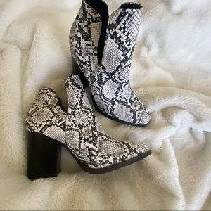 White snakeskin ankle boots